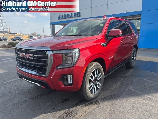 2022 GMC Yukon AT4 in Cayenne Red Tintcoat — front three-quarter view